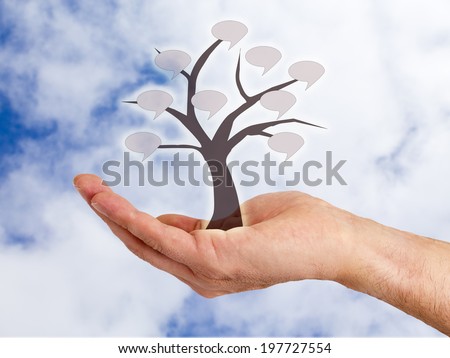 hand holding tree