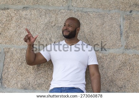 black man on the street pointing