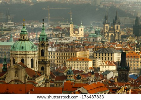 St. Nicholas church in Mala Strana in the foreground, St. Nicholas church in Old Town, Church of Our Lady before Tyn, Church of St. James the Greater, Charles Bridge and Powder tower