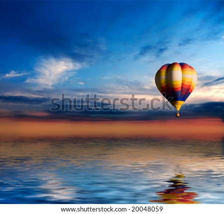 Balloon in sunset sky  fly over the sea