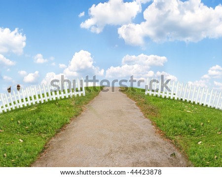 Funny landscape with country road on a hill and white fence. Background