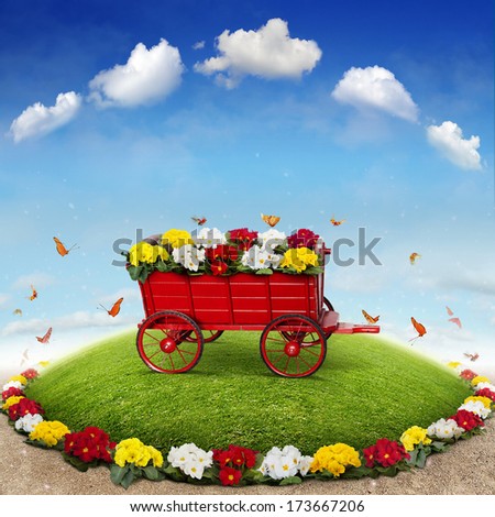 The beautiful Background with Flowerbed and Flower cart