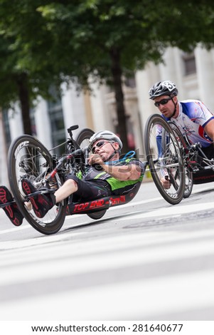Chattanooga, Tennessee, USA.  25th May, 2015. Cyclists with disabilities compete in the 2015 USA Cycling National Championship Criterium Para-Cycling event, held in the streets of Chattanooga.