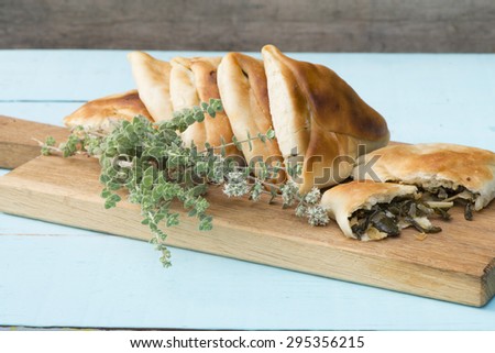 Middle eastern food fatayer stuffed in spinach