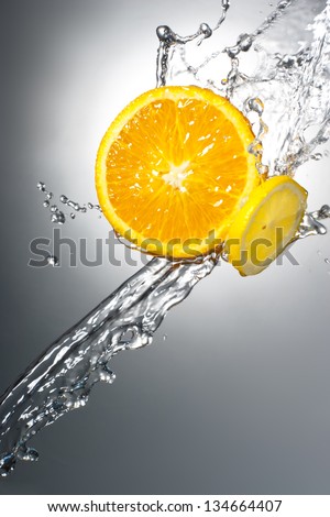 Orange Citrus Fruit with Water Splash