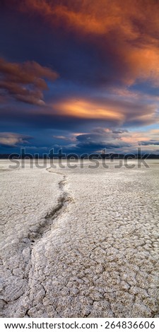 Dry Lake bed at sunset with groove
