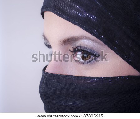 Close up of a veiled young woman