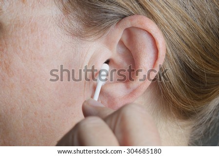 Cotton swab in the ear