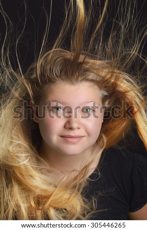 blonde girl with flying hair