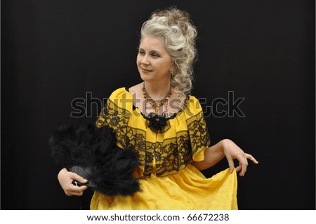 Charming lady wearing antique masquerade costume
