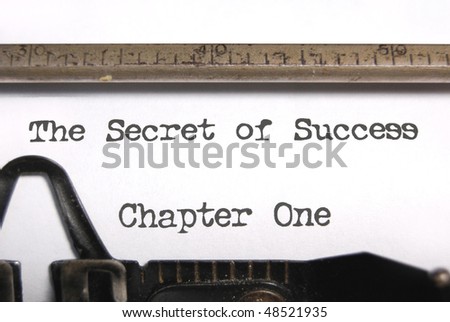 The secret of success typed on an old typewriter