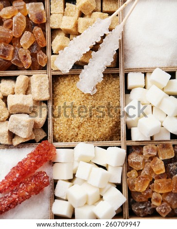 Various kinds of sugar in wooden box