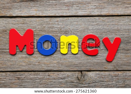Money word made of colorful magnets