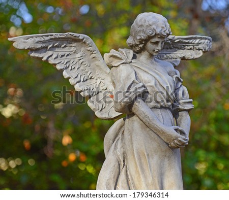 Angel Sculpture in a Garden