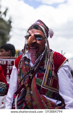 PISAC, PERU - JULY 16, 2013: masked dancers at Virgen del Carmen parade