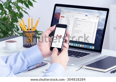 Google Gmail email inbox interface on the Apple MacBook Pro screen that is on office desk. Gmail is a free email service provided by Google. Varna, Bulgaria - May 29, 2015.