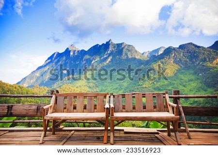 Bamboo wood chair with the background of mountain in Chiangmai, Thailand