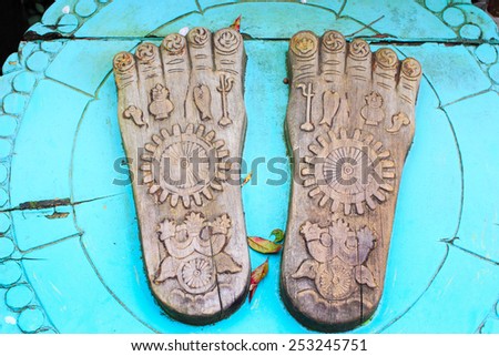 NARA, JAPAN - April 13: The ancient Buddha foot plate the holy object in Japanese temple, \'Hasedera\' with natural park in spring on April 13, 2014 at Hasedera,Nara, Japan.