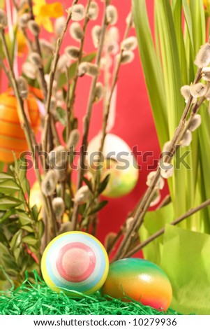 Easter floral arrangement on a red background.