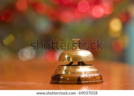 old hotel bell on a wood stand at Christmas
