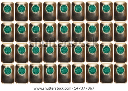 Background of metal cans of olive oil on a white background