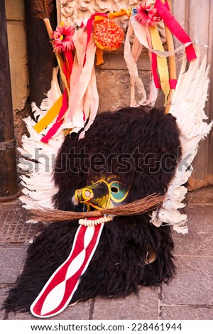 Slovene national carnival mask Kurent head piece, laying on the floor