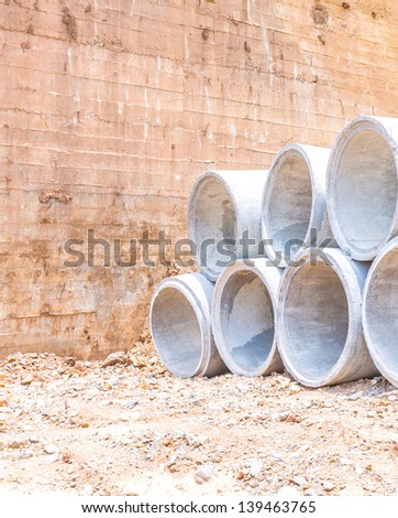 Concrete water pipes stacked in rows