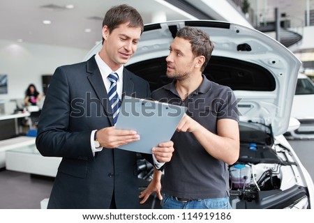 The seller and the buyer in the auto show