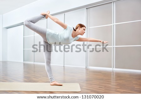 Young girl is engaged in gymnastics