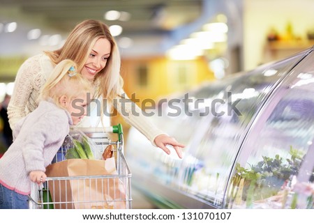Mother and daughter in the store