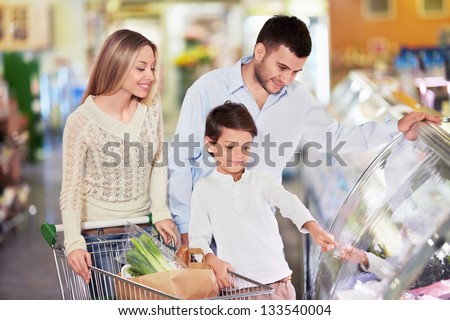 Family with child in a store