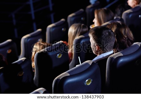 Group Of People Watching Movie At The Cinema