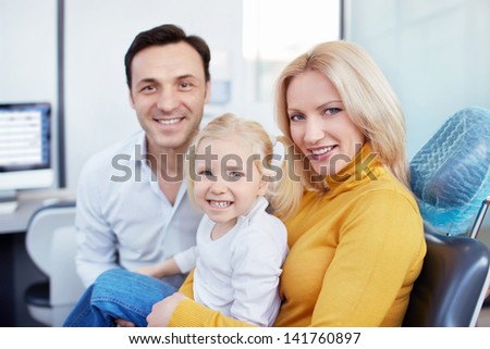 Family in the dental clinic