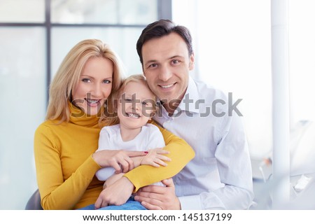 Happy family in a medical clinic