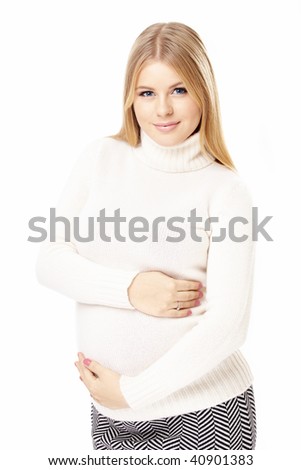 stock photo Beautiful pregnant blonde embraces a stomach isolated