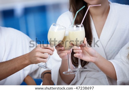 People meet glasses cocktails on a forward background
