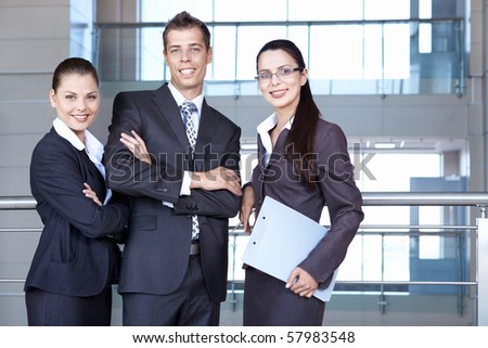 Business people in suits against the office