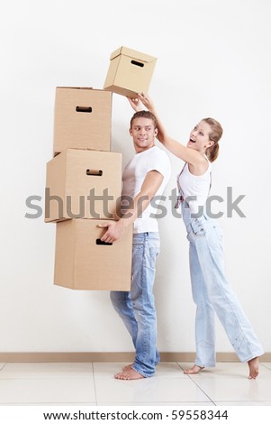 Young girl puts a box man