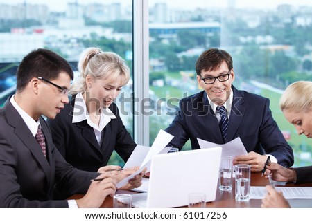 Staff members at the meeting in the office
