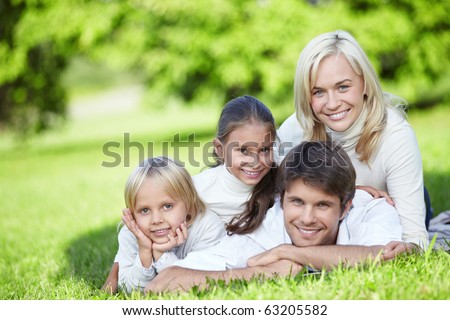 A happy family with two children outdoors