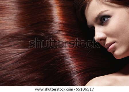 Attractive girl with beautiful healthy hair