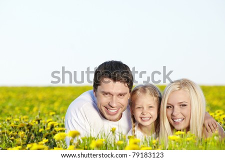 A happy family  in a field