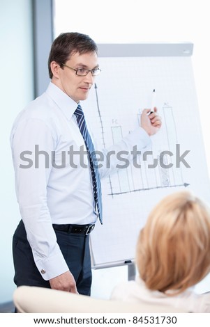 Mature man about the schedule at the office