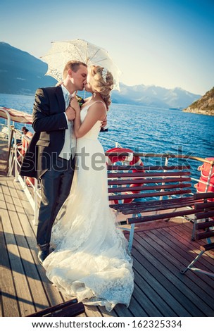 Kissing married couple on the ship
