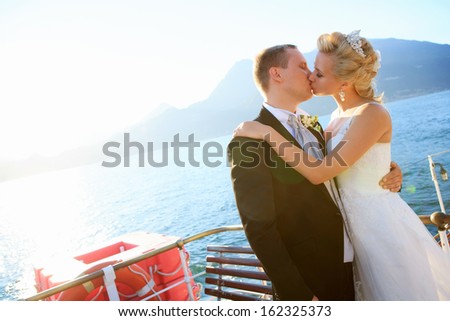 Kissing married couple on the ship