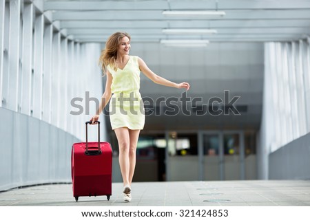 Young girl with a suitcase