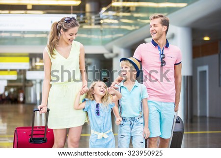 Family with child in the airport