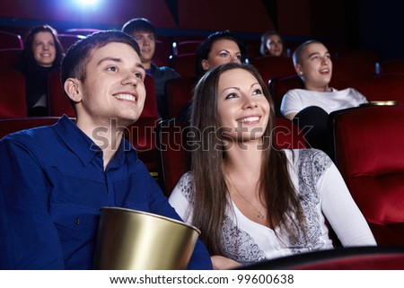 Smiling people in the cinema