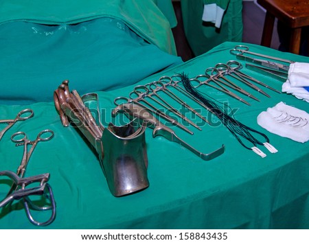 Surgeon and old surgical tools.(simulation)