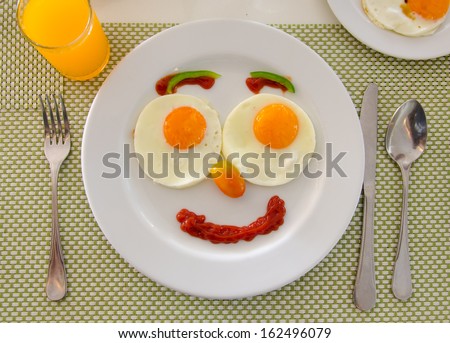 Happy Face Frying Eggs Breakfast.